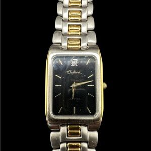 Bulova Two-Tone Rectangular Black Dial Quartz Watch. New old stock. Unused